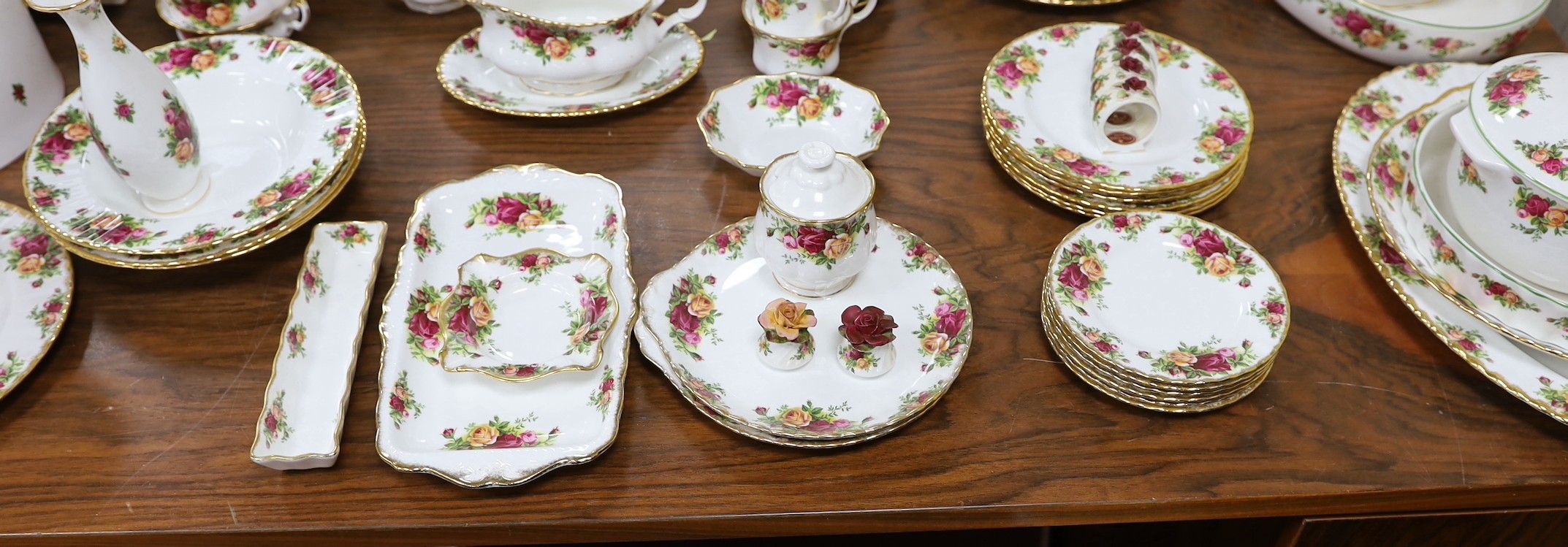 Royal Albert Old Country Rose dinner and tea service, to include a large biscuit box three tier cake stand etc